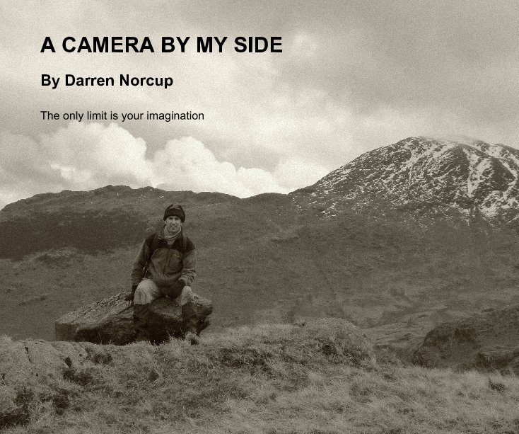 Bekijk A CAMERA BY MY SIDE op Darren Norcup