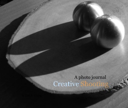 A A photo journal Creative Shooting book cover