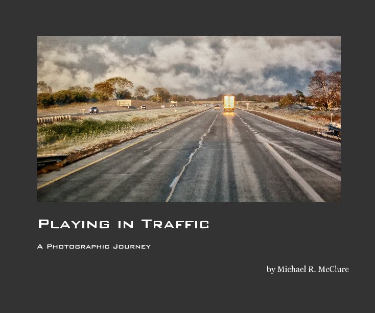 View Playing in Traffic by Michael R. McClure