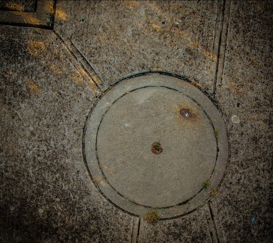 View Manholes by Charles McKean