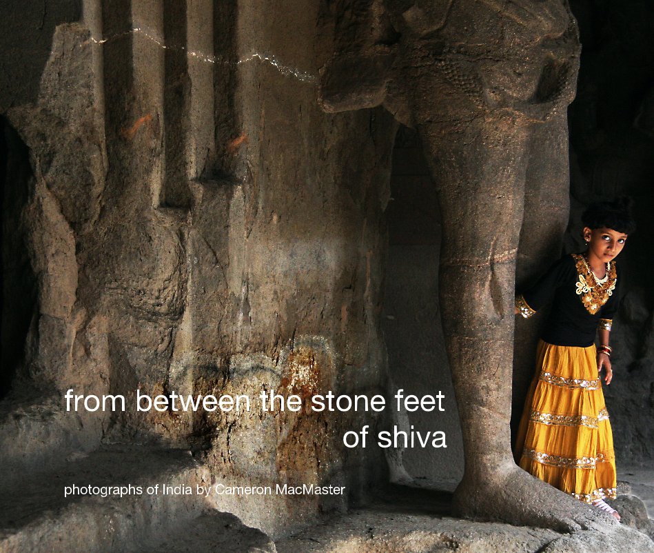 View from between the stone feet of shiva by Cameron MacMaster